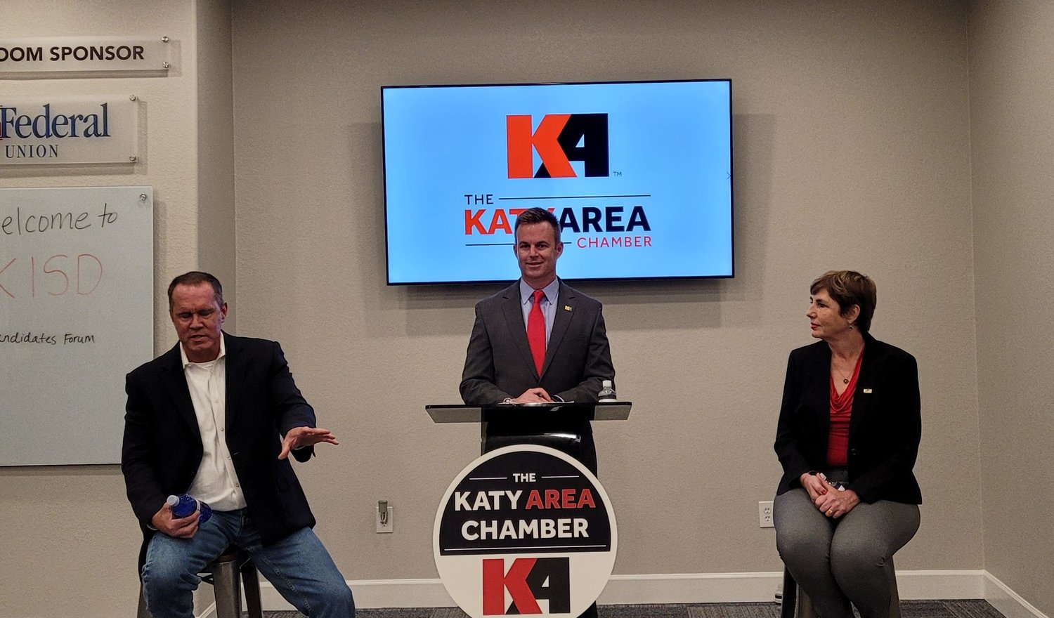 Incumbent Position Seven Trustee Dawn Champagne (right) is facing challenger Walter Butler (left) in the May 1 election. Both candidates participated in a candidate forum hosted by the Katy Area Chamber of Commerce and moderated by Jason Burdine (center), a trustee for Fort Bend ISD.
